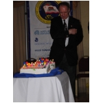 04a  Phil Lighting Candles on Birthday Cake for Kenny and Diane.JPG